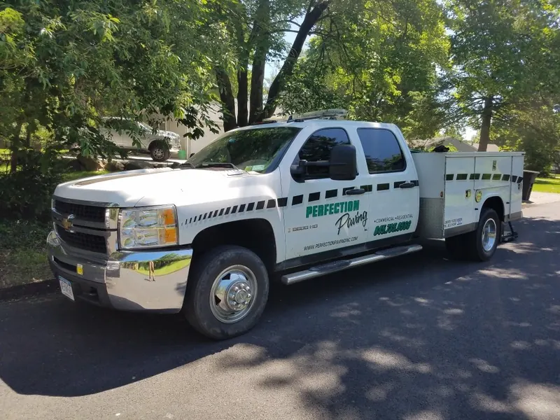 Perfection Paving pickup with the company lettering