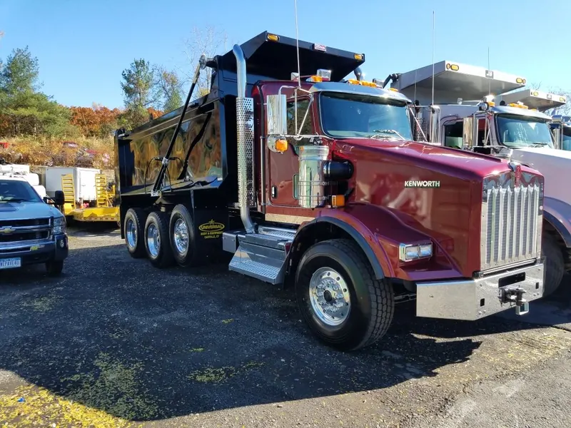 Perfection Paving dump trucks